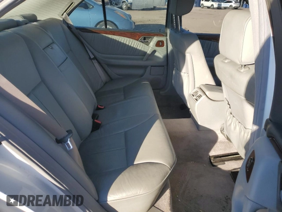 1999 Mercedes-Benz E-Class with VIN WDBJF82H1XX024280, listed as a Copart auction lot 83213204 with 212,712 mi miles and Salvage Title. Bid and sale history available at carsss.com. Image 11.