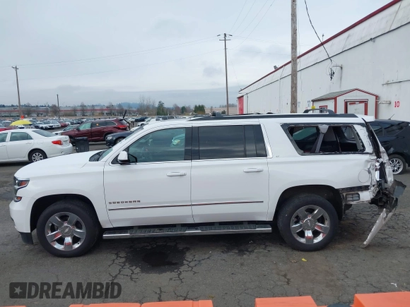 2016 Chevrolet Suburban LT with VIN 1GNSKHKC5GR468635, listed as a IAAI auction lot 41735340 with 102,795 mi miles and . Bid and sale history available at DreamBid. Image 15.
