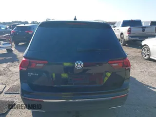 2020 Volkswagen Tiguan SE z VIN 3VV3B7AX1LM019574, wystawiony jako IAAI lot #41450002 z przebiegiem 44 553 mil mil oraz . Historia ofert i sprzedaży dostępna na DreamBid. Obrazek 16.