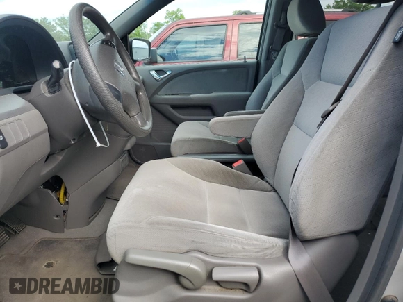 2010 Honda Odyssey LX with VIN 5FNRL3H25AB027316, listed as a Copart auction lot 57937805 with 181,551 mi miles and Salvage title. Bid and sale history available at DreamBid. Image 7.