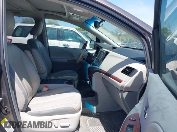 2012 Toyota Sienna XLE AAS with VIN 5TDYK3DCXCS251984, listed as a IAAI auction lot 42235046 with 126,404 mi miles and . Bid and sale history available at DreamBid. Image 5.