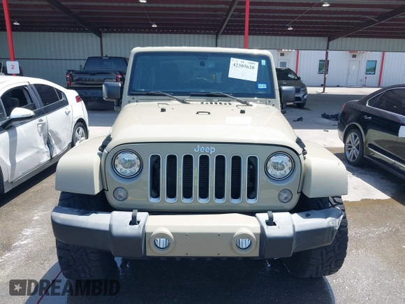 2018 Jeep Wrangler Sahara z VIN 1C4AJWBGXJL811092, wystawiony jako IAAI lot #42305620 z przebiegiem 41 021 mil mil oraz . Historia ofert i sprzedaży dostępna na DreamBid. Obrazek 12.
