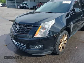 2014 Cadillac SRX Performance Collection with VIN 3GYFNCE31ES683465, listed as a IAAI auction lot 42107705 with 117,285 mi miles. Bid and sale history available at carsss.com. Image 6.