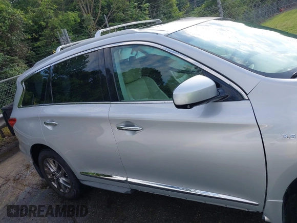 2015 Infiniti QX60 with VIN 5N1AL0MM8FC511242, listed as a IAAI auction lot 42577329 with 144,140 mi miles and . Bid and sale history available at DreamBid. Image 12.