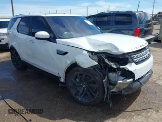2018 Land Rover Discovery HSE Luxury z VIN SALRT2RV1JA075819, wystawiony jako IAAI lot #42157121 z przebiegiem 93 829 mil mil oraz . Historia ofert i sprzedaży dostępna na DreamBid. Obrazek 1.