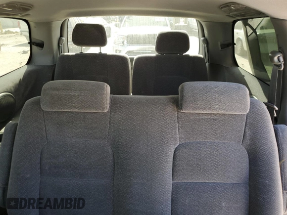 2003 Kia Sedona LX with VIN KNDUP131236453481, listed as a Copart auction lot 75660244 with 125,628 mi miles and Salvage Title. Bid and sale history available at carsss.com. Image 10.
