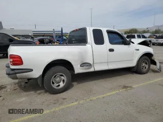 1999 Ford F-150 XL with VIN 1FTZX0721XKA49751, listed as a Copart auction lot 52429195 with Not provided miles and Salvage title. Bid and sale history available at DreamBid. Image 3.