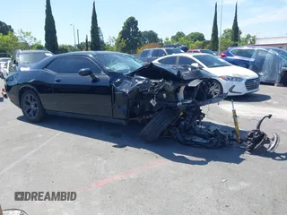 2019 Dodge Challenger R/T z VIN 2C3CDZBT8KH574054, wystawiony jako IAAI lot #42321371 z przebiegiem 55 318 mil mil oraz . Historia ofert i sprzedaży dostępna na DreamBid. Obrazek 1.