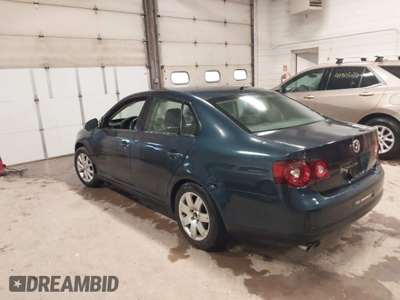 2009 Volkswagen Jetta z VIN 3VWHZ71K79M020139, wystawiony jako IAAI lot #42292767 z przebiegiem 156 619 mil mil oraz . Historia ofert i sprzedaży dostępna na DreamBid. Obrazek 3.