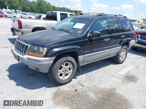 2000 Jeep Grand Cherokee Laredo with VIN 1J4GW48N7YC357376, listed as a IAAI auction lot 42503429 with 211,154 mi miles and . Bid and sale history available at DreamBid. Image 2.