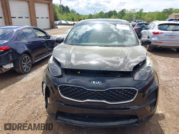 2020 Kia Sportage LX with VIN KNDPM3AC7L7755719, listed as a IAAI auction lot 42026994 with 49,537 mi miles and . Bid and sale history available at DreamBid. Image 13.