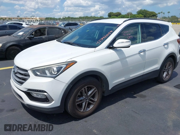 2017 Hyundai Santa Fe 2.4L z VIN 5NMZU3LB9HH034850, wystawiony jako IAAI lot #42342054 z przebiegiem 192 154 mil mil oraz . Historia ofert i sprzedaży dostępna na DreamBid. Obrazek 2.