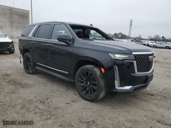 2021 Cadillac Escalade Premium Luxury with VIN 1GYS4BKL9MR215159, listed as a Copart auction lot 48577415 with 50,773 mi miles and Salvage Title. Bid and sale history available at carsss.com. Image 4.