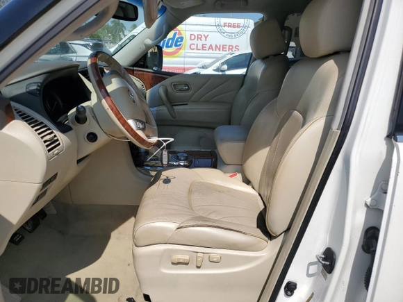 2015 Infiniti QX80 with VIN JN8AZ2NE9F9080904, listed as a Copart auction lot 58496575 with 87,240 mi miles and Clean title. Bid and sale history available at DreamBid. Image 7.