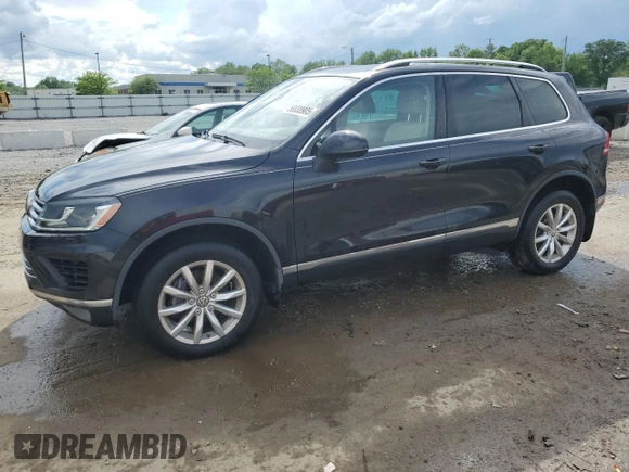 2016 Volkswagen Touareg Sport z VIN WVGEF9BP3GD008823, wystawiony jako Copart lot #56838985 z przebiegiem 49 612 mil mil oraz Nie do naprawy • Non repairable. Historia ofert i sprzedaży dostępna na DreamBid. Obrazek 1.