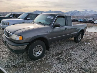 1999 Mazda B-Series Truck SE with VIN 4F4ZR17X1XTM10294, listed as a Copart auction lot 87415884 with 125,146 mi miles and Salvage Title. Bid and sale history available at DreamBid. Image 1.