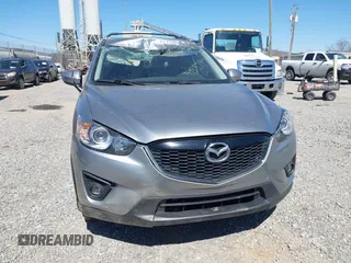 2014 Mazda CX-5 Grand Touring with VIN JM3KE4DY3E0368169, listed as a IAAI auction lot 41857976 with 127,853 mi miles. Bid and sale history available at carsss.com. Image 12.