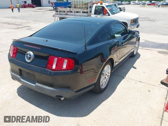 2012 Ford Mustang Premium with VIN 1ZVBP8AM0C5221428, listed as a IAAI auction lot 42273202 with 196,402 mi miles and . Bid and sale history available at DreamBid. Image 4.