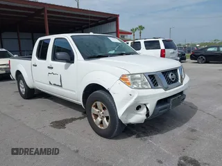 2013 Nissan Frontier SL with VIN 1N6AD0FR3DN735236, listed as a IAAI auction lot 42463538 with 210,427 mi miles and . Bid and sale history available at DreamBid. Image 1.