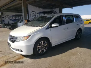 2016 Honda Odyssey Touring Elite with VIN 5FNRL5H97GB058469, listed as a Copart auction lot 61254055 with 100,526 mi miles and Salvage title. Bid and sale history available at DreamBid. Image 1.