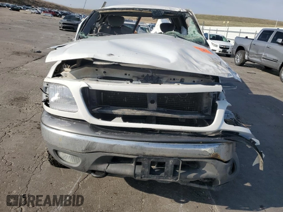 2002 Ford F-150 XL with VIN 1FTRX18L12NA01509, listed as a Copart auction lot 51098435 with Not provided miles and Salvage title. Bid and sale history available at DreamBid. Image 5.