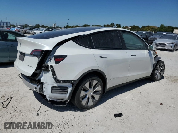 2023 Tesla Model Y Long Range with VIN 7SAYGDEEXPF770800, listed as a Copart auction lot 48324515 with 25,205 mi miles and Salvage Title. Bid and sale history available at DreamBid. Image 3.