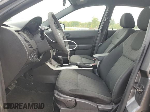 2009 Ford Focus SE with VIN 1FAHP35N39W258484, listed as a Copart auction lot 72679704 with 88,824 mi miles and Salvage Title. Bid and sale history available at DreamBid. Image 7.
