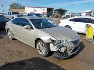 2013 Lexus ES 300h z VIN JTHBW1GG3D2017481, wystawiony jako IAAI lot #41394725 z przebiegiem 259 300 mil mil oraz . Historia ofert i sprzedaży dostępna na DreamBid. Obrazek 1.
