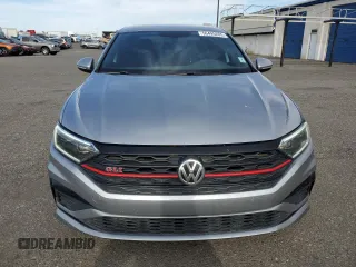 2019 Volkswagen Jetta GLI S z VIN 3VW6T7BU1KM244828, wystawiony jako Copart lot #56495205 z przebiegiem 112 512 mil mil oraz Szkody całkowita. Historia ofert i sprzedaży dostępna na DreamBid. Obrazek 5.