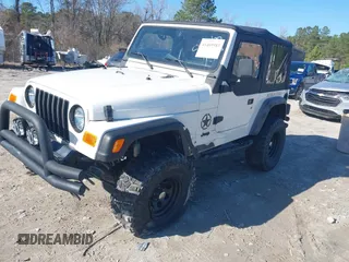1997 Jeep Wrangler Sport with VIN 1J4FY19S7VP483735, listed as a IAAI auction lot 41469983 with 150,542 mi miles. Bid and sale history available at carsss.com. Image 17.
