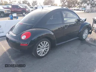 2008 Volkswagen New Beetle Coupe S with VIN 3VWRG31C08M500842, listed as a IAAI auction lot 41598559 with 19,611 mi miles. Bid and sale history available at carsss.com. Image 4.