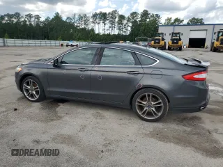 2016 Ford Fusion Titanium with VIN 3FA6P0K90GR180288, listed as a Copart auction lot 60218155 with 140,502 mi miles and Salvage title. Bid and sale history available at DreamBid. Image 2.