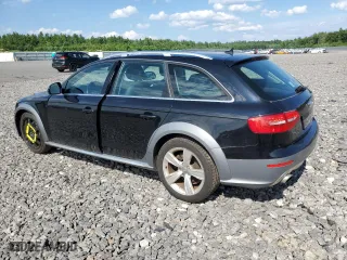 2013 Audi allroad Premium Plus with VIN WA1UFAFL9DA124026, listed as a Copart auction lot 63621474 with 130,664 mi miles and Salvage Title. Bid and sale history available at carsss.com. Image 2.