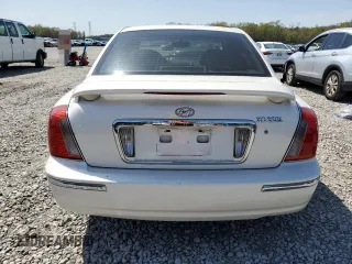 2004 Hyundai XG with VIN KMHFU45EX4A335434, listed as a Copart auction lot 51199575 with 179,114 mi miles and Salvage Title. Bid and sale history available at DreamBid. Image 6.