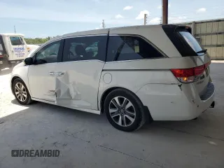 2014 Honda Odyssey Touring z VIN 5FNRL5H9XEB123330, wystawiony jako Copart lot #59023145 z przebiegiem 118 371 mil mil oraz Nie do naprawy • Non repairable. Historia ofert i sprzedaży dostępna na DreamBid. Obrazek 2.