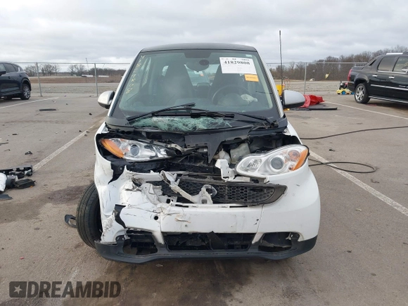 2013 Smart fortwo Pure with VIN WMEEJ3BA2DK702004, listed as a IAAI auction lot 41829808 with 53,545 mi miles and . Bid and sale history available at DreamBid. Image 13.