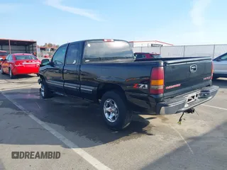 2002 Chevrolet Silverado 1500 LT with VIN 1GCEK19T52E262279, listed as a IAAI auction lot 40711298 with 251,098 mi miles. Bid and sale history available at carsss.com. Image 3.