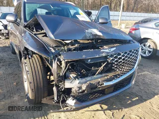 2021 Genesis GV80 with VIN KMUHBDSB1MU060299, listed as a IAAI auction lot 41124819 with 44,465 mi miles and . Bid and sale history available at DreamBid. Image 6.