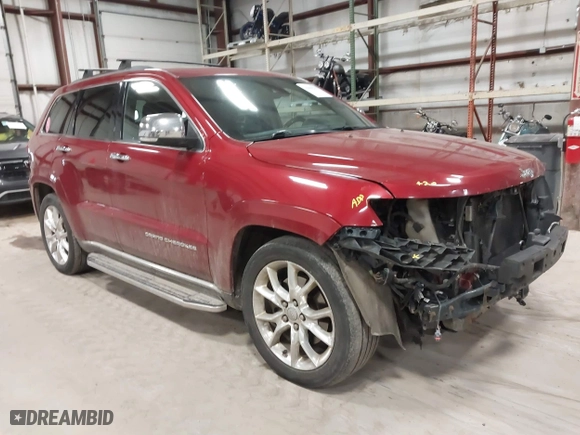 2014 Jeep Grand Cherokee Summit with VIN 1C4RJFJT4EC308729, listed as a IAAI auction lot 41694212 with 175,654 mi miles. Bid and sale history available at carsss.com. Image 1.