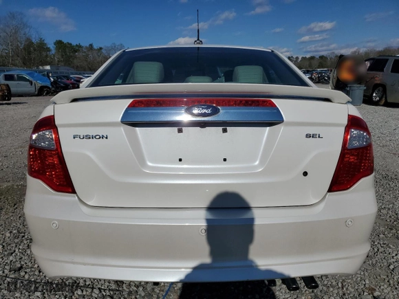 2012 Ford Fusion SEL with VIN 3FAHP0JA4CR205577, listed as a Copart auction lot 46174895 with 129,575 mi miles and Salvage Title. Bid and sale history available at carsss.com. Image 6.
