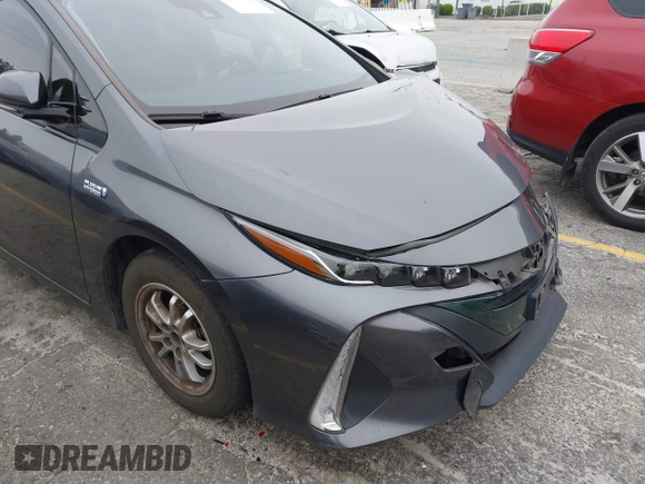 2018 Toyota Prius Plus with VIN JTDKARFP5J3095377, listed as a IAAI auction lot 42153552 with 77,255 mi miles and . Bid and sale history available at DreamBid. Image 18.