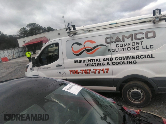 2016 Ford Transit Cargo with VIN 1FTYR1ZM7GKA14464, listed as a IAAI auction lot 41230405 with 120,604 mi miles and . Bid and sale history available at DreamBid. Image 14.