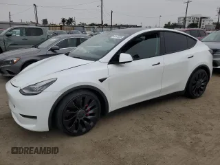 2022 Tesla Model Y Performance z VIN 7SAYGDEFXNF384268, wystawiony jako Copart lot #60141005 z przebiegiem Nie podano mil oraz Szkoda całkowita • Salvage title. Historia ofert i sprzedaży dostępna na DreamBid. Obrazek 1.