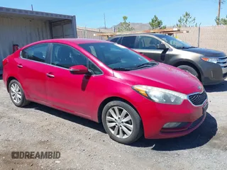 2014 Kia Forte EX with VIN KNAFX4A84E5085384, listed as a IAAI auction lot 42171849 with 138,997 mi miles. Bid and sale history available at carsss.com. Image 1.