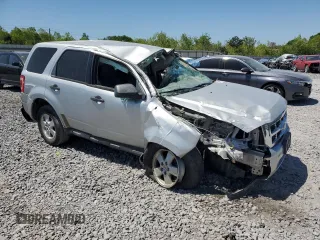2011 Ford Escape XLS с VIN 1FMCU0C77BKB53875, выставлен на аукционе Copart как лот 53185705 с пробегом 222 070 миль миль и Списание • Salvage title. История ставок и продаж доступна на DreamBid. Изображение 4.