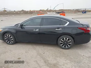 2018 Nissan Altima SR with VIN 1N4AL3APXJC156643, listed as a IAAI auction lot 41723175 with 144,368 mi miles and . Bid and sale history available at carsss.com. Image 14.
