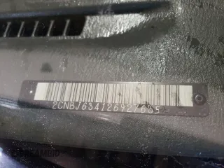 2002 Chevrolet Tracker LT z VIN 2CNBJ634126927635, wystawiony jako Copart lot #78814333 z przebiegiem 224 726 mil mil oraz Szkoda całkowita • Salvage title. Historia ofert i sprzedaży dostępna na DreamBid. Obrazek 13.