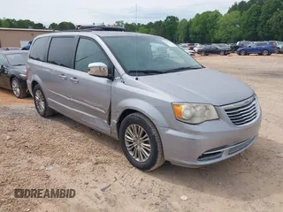 2014 Chrysler Town & Country Touring L with VIN 2C4RC1CG9ER376058, listed as a IAAI auction lot 42099348 with 186,226 mi miles and . Bid and sale history available at DreamBid. Image 1.