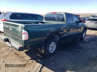1999 Dodge Dakota SLT with VIN 1B7GG22X0XS239398, listed as a Copart auction lot 80143414 with 147,646 mi miles and Salvage Title. Bid and sale history available at DreamBid. Image 3.