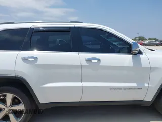 2014 Jeep Grand Cherokee Limited with VIN 1C4RJFBT4EC259448, listed as a IAAI auction lot 42285739 with 129,120 mi miles and . Bid and sale history available at DreamBid. Image 13.